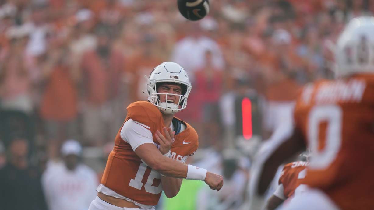 Texas quarterback Arch Manning (16) throws against Ohio State during the first half of an NCAA college football game in Austin, Texas, Saturday, Sept. 12, 2026.