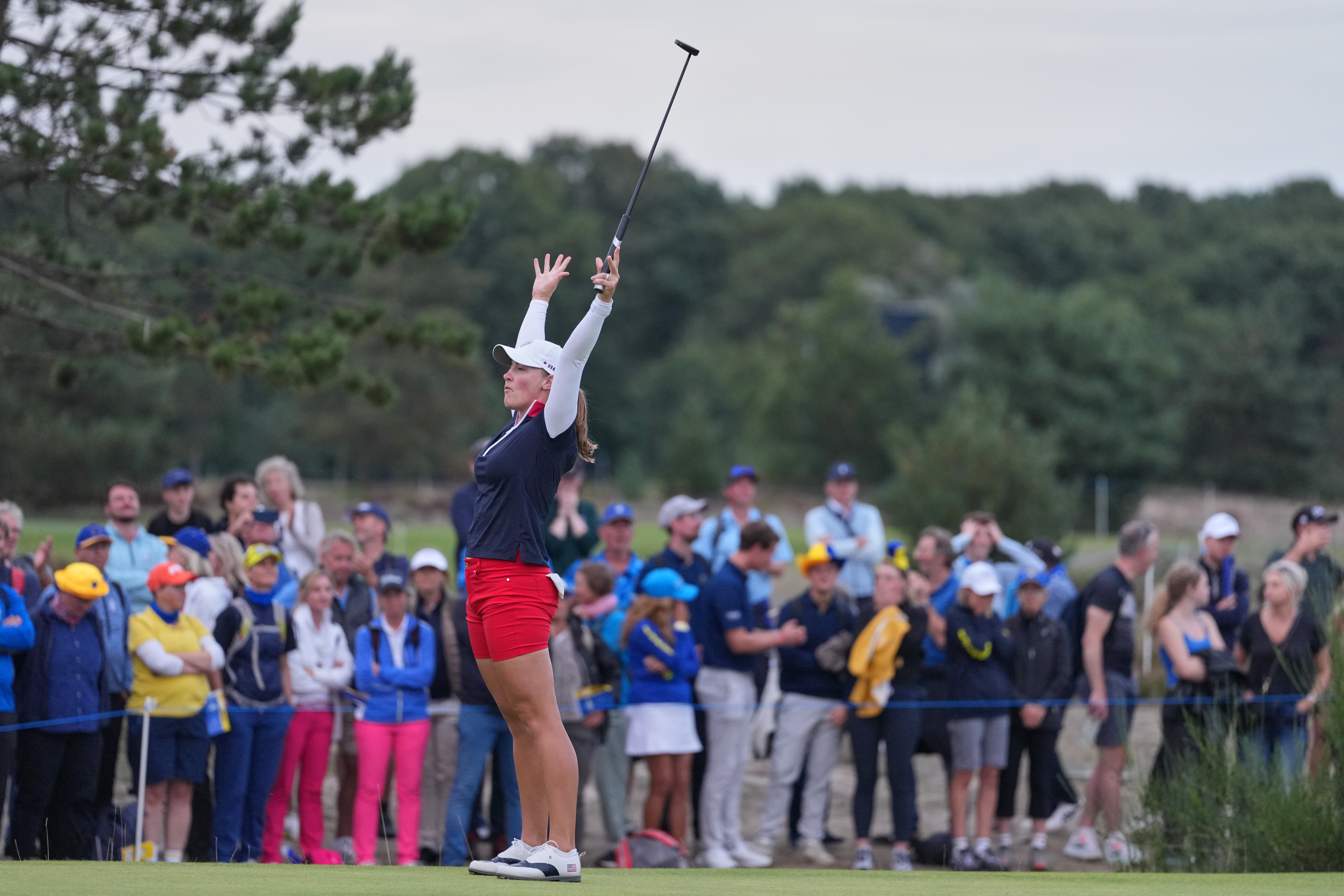 Jennifer Kupcho of the United States celebrates after holing a putt on the 18th green during the Solheim Cup in Den Bosch, Netherlands, Saturday, Sept. 12, 2026. 
