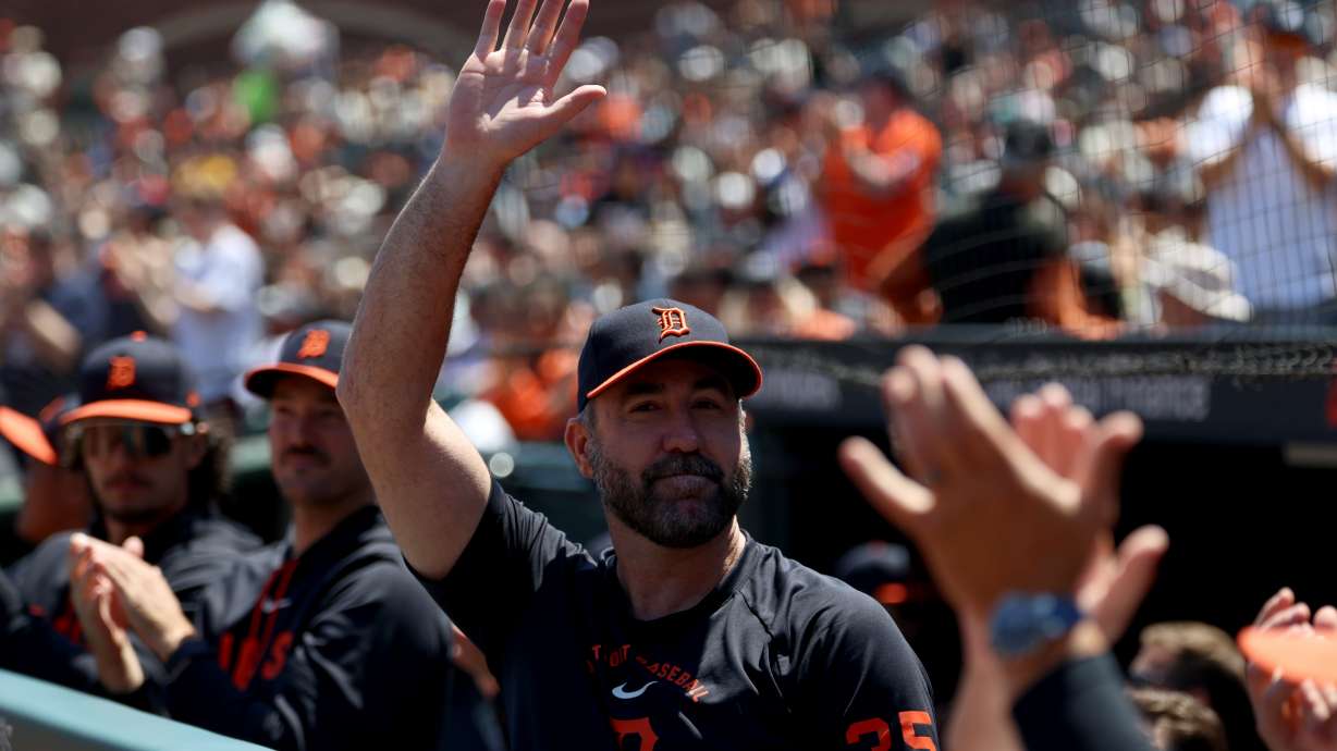 FILE - Detroit Tigers pitcher Justin Verlander, center, acknowledges the crowd during the second inning of a baseball game against the San Francisco Giants in San Francisco, on Aug. 9, 2026.