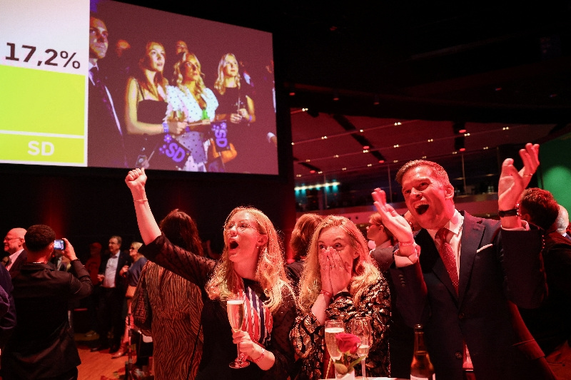Supporters of Sweden's Social Democratic Party react to early results of the general election in Stockholm, Sweden, on Sunday.