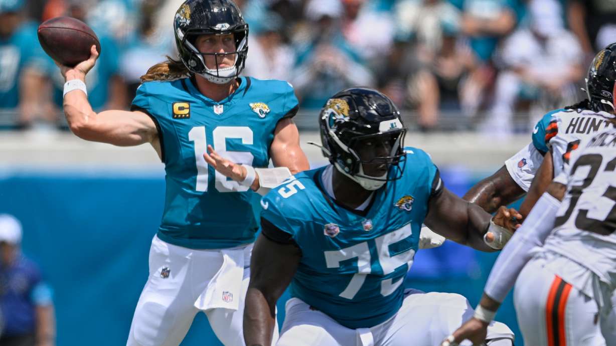 Jacksonville Jaguars quarterback Trevor Lawrence (16) passes in the first half of an NFL football game against the Cleveland Browns, Sunday, Sept. 13, 2026, in Jacksonville.