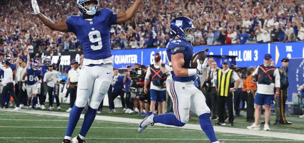 Giants' offense rolls over the Cowboys to give coach John Harbaugh a 28-20 win in his debut