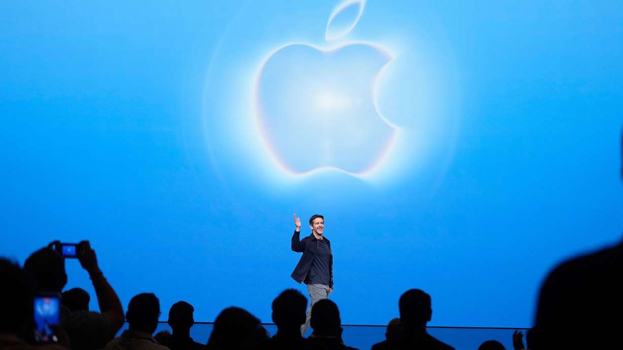Apple CEO John Ternus waves on stage during an announcement of new products on Wednesday, in Cupertino, California.