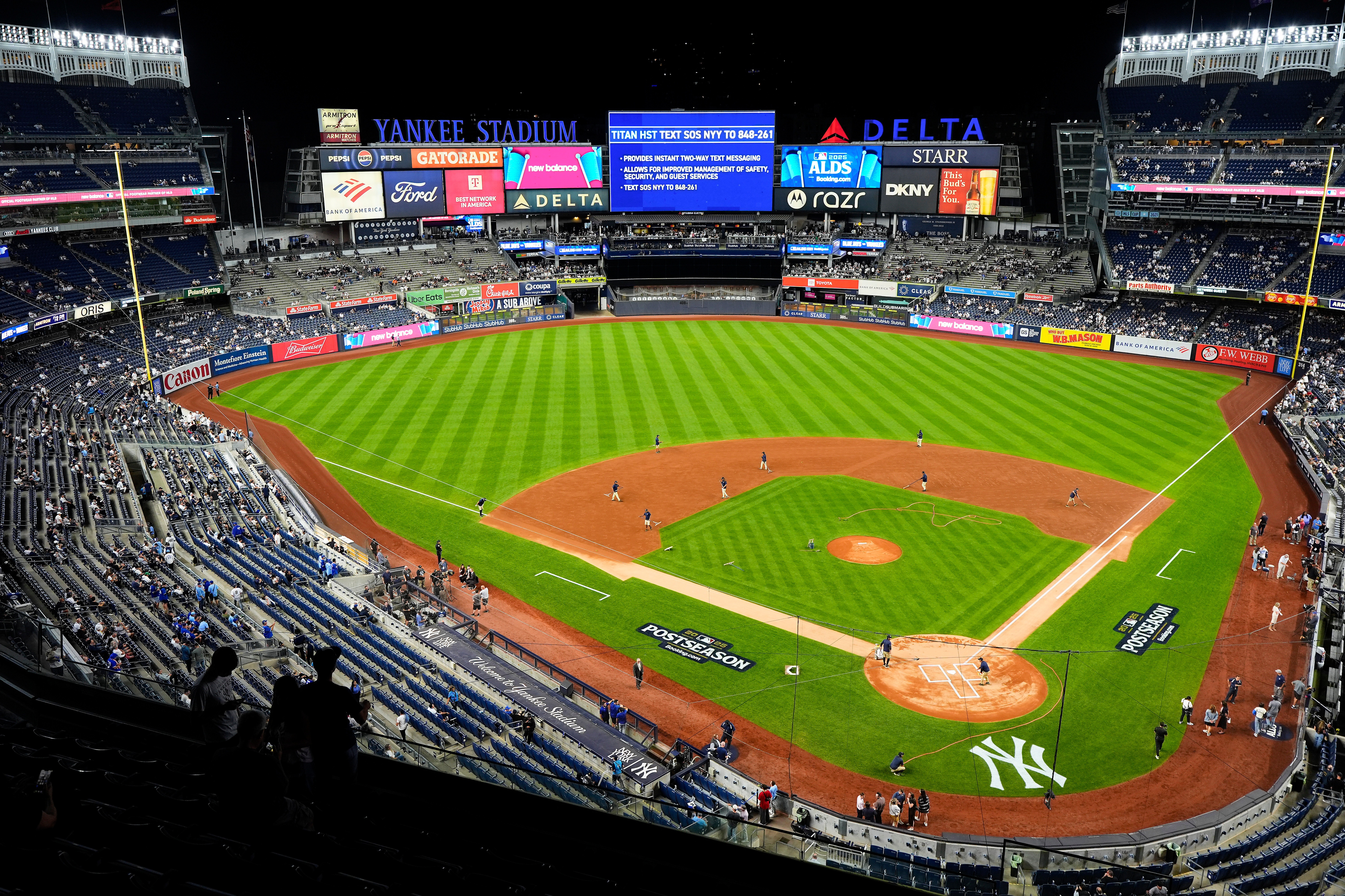 FILE - The grounds crew grooms the field before Game 3 of baseball's American League Division Series between the New York Yankees and the Toronto Blue Jays, Tuesday, Oct. 7, 2025, in New York. 