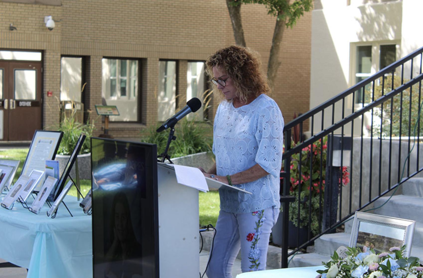 Hevenlee Hoopes, the mother of Amber Hoopes, speaking at the Missing Persons Day event.
