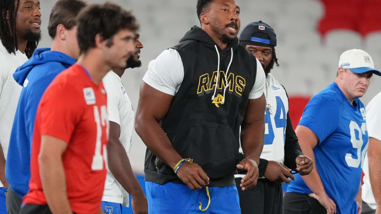 Los Angeles Rams outside linebacker Myles Garrett, centre, works out during a practice session for an NFL football game against the San Francisco 49ers., in Melbourne, Australia, Thursday, Sept. 10, 2026.