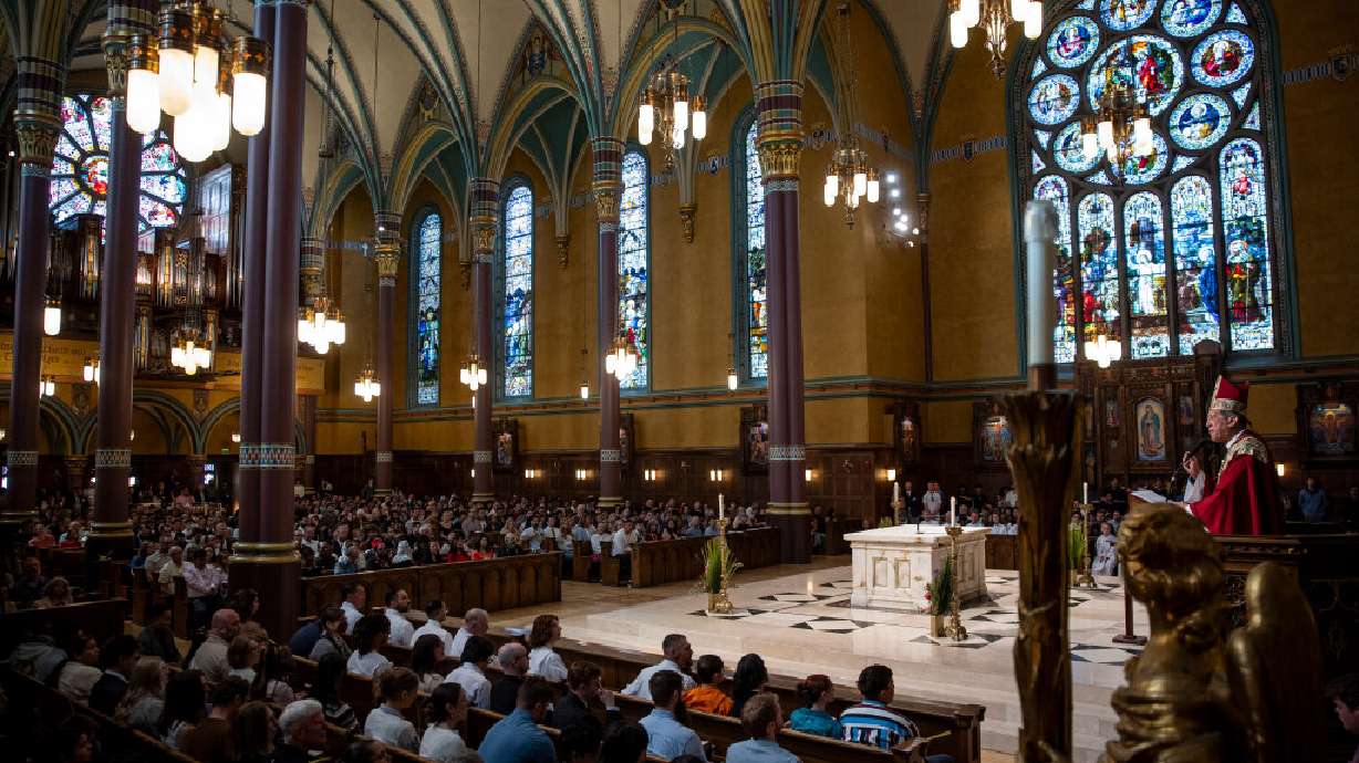 Bishop Oscar A. Solis, of the Catholic Diocese of Salt Lake City, speaks during Palm Sunday Mass at the Cathedral of the Madeleine in Salt Lake City on March 29. Bishop Solis will be presiding over the Utah Catholic Conference on Saturday.
