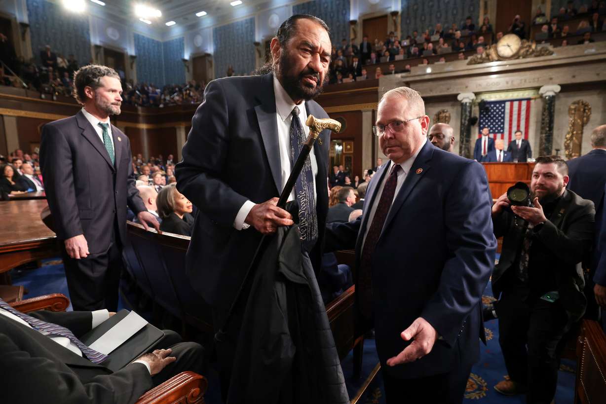 Rep. Al Green, D-Texas, is removed from the chamber as President Donald Trump addresses a joint session of Congress at the Capitol in Washington, March 4, 2025.
