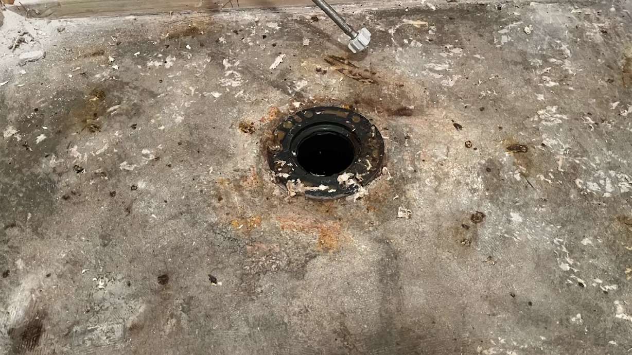 The toilet was removed in Barbara Jensen's condo, along with flooring and other fixtures damage by sewage backups caused by another owner in the building flushing non-flushable materials. It's the stuff of nightmares: something coming up from your sewer line, repeatedly.