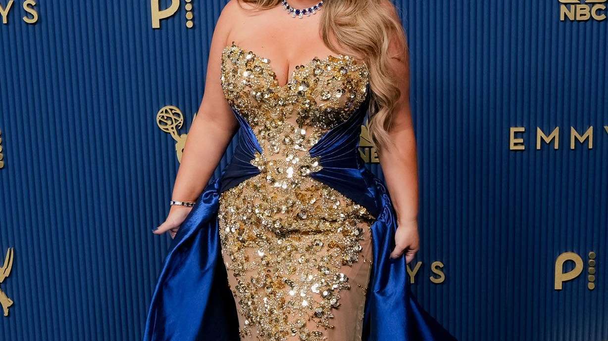 Influencer Trisha Paytas, who is co-hosting the Emmys red carpet livestream, mixed shimmering gems and blue velvet.