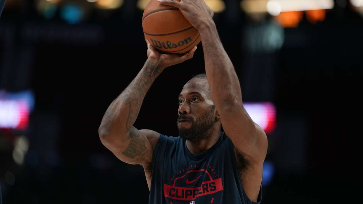 FILE - Los Angeles Clippers forward Kawhi Leonard warms up before an NBA basketball game April 10, 2026, in Portland, Ore.