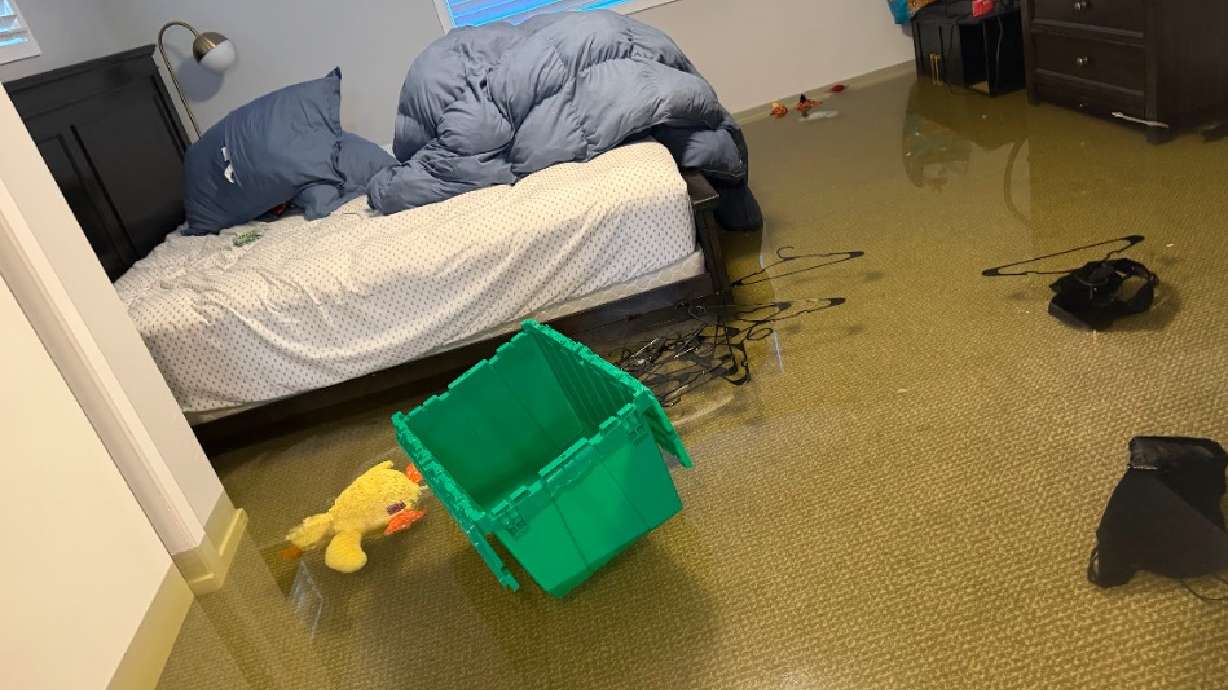Floodwaters fill a bedroom inside a home in Salt Lake City's Poplar Grove neighborhood on Aug. 16. A new fund launched on Monday seeks to help the more than a dozen residents affected by the flooding, which was caused by a broken water main.