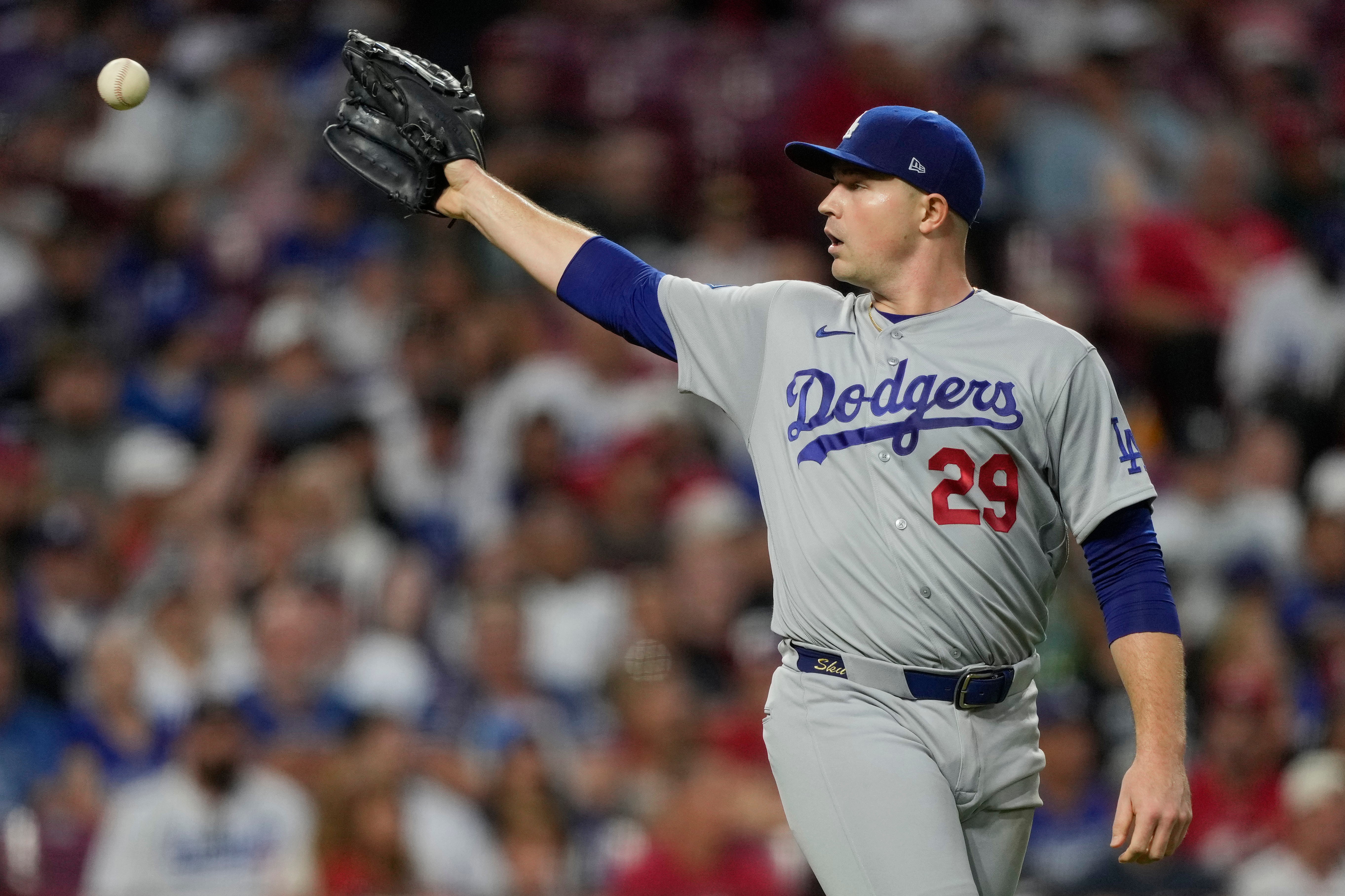 Los Angeles Dodgers pitcher Tarik Skubal take a throw during the fifth inning of a baseball game against the Cincinnati Reds, Monday, Sept. 14, 2026, in Cincinnati. 