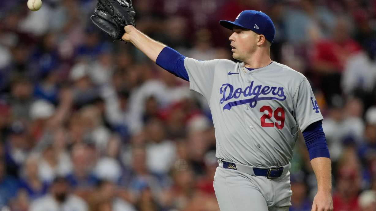 Los Angeles Dodgers pitcher Tarik Skubal take a throw during the fifth inning of a baseball game against the Cincinnati Reds, Monday, Sept. 14, 2026, in Cincinnati.