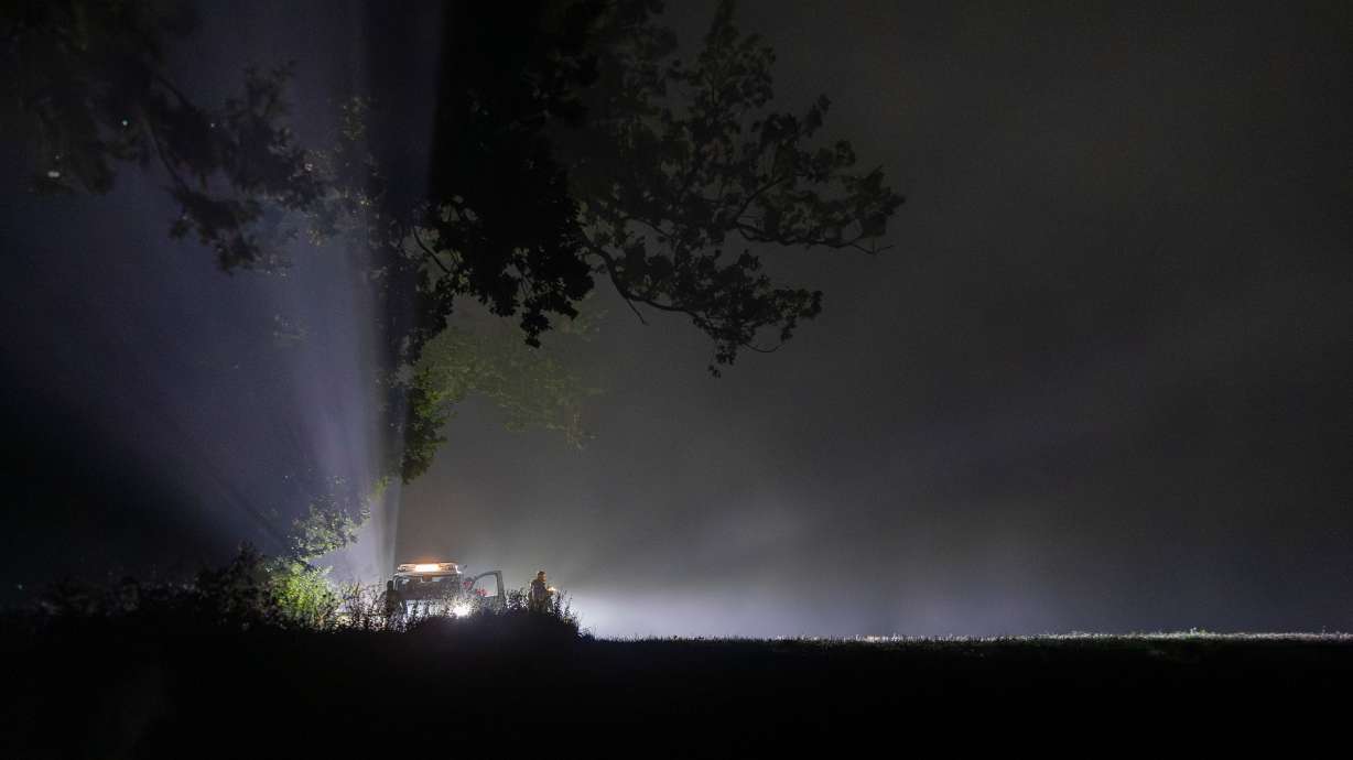 Lithuanian soldiers are securing the area where Italian fighter jets during NATO's Baltic Air Policing Mission shot down a drone early Tuesday near Pratkunai village, Kaisiadorys district, northwest of the capital Vilnius.