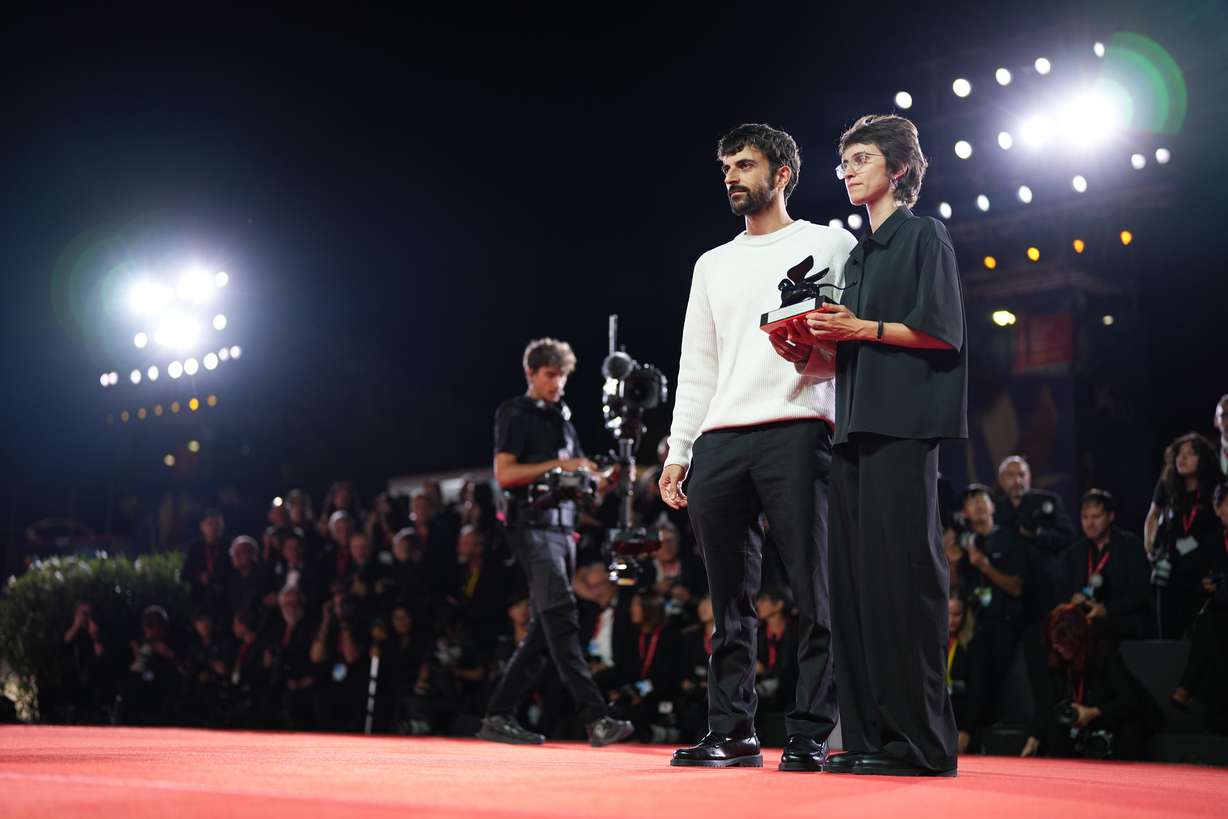 Directors Rachel Szor, left, and Yuval Abraham, winners of the special jury prize for the film 'NAZA', pose for photographers at the awards photo call during the closing ceremony of the 83rd edition of the Venice Film Festival in Venice, Italy, on Saturday.