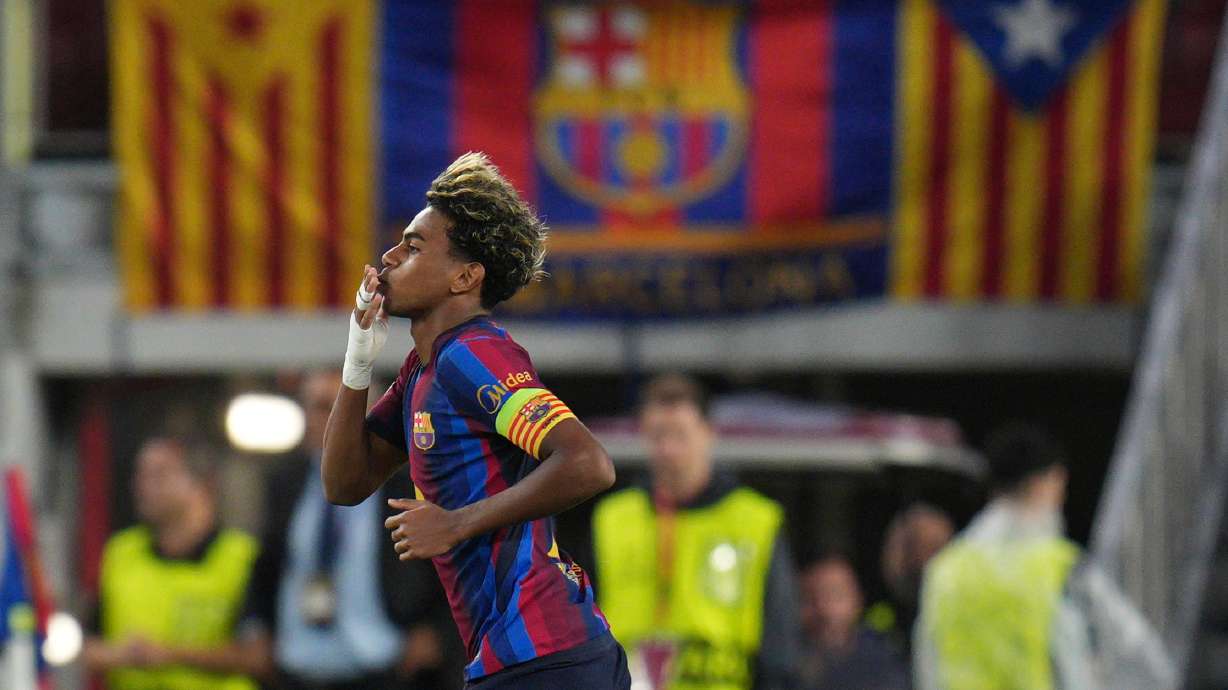 Barcelona's Lamine Yamal celebrates after scoring his side's fourth goal during the Champions League opening phase soccer between Barcelona and Feyenoord in Barcelona, Spain, Wednesday, Sept. 9, 2026.