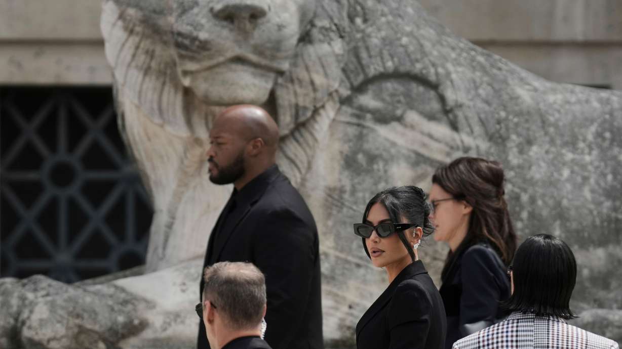 Kim Kardashian arrives to testify regarding a robbery of millions of dollars in jewels from her Paris hotel room in 2016, in Paris on May 13, 2025. She was awarded 1 euro as compensation, as she requested, on Tuesday.