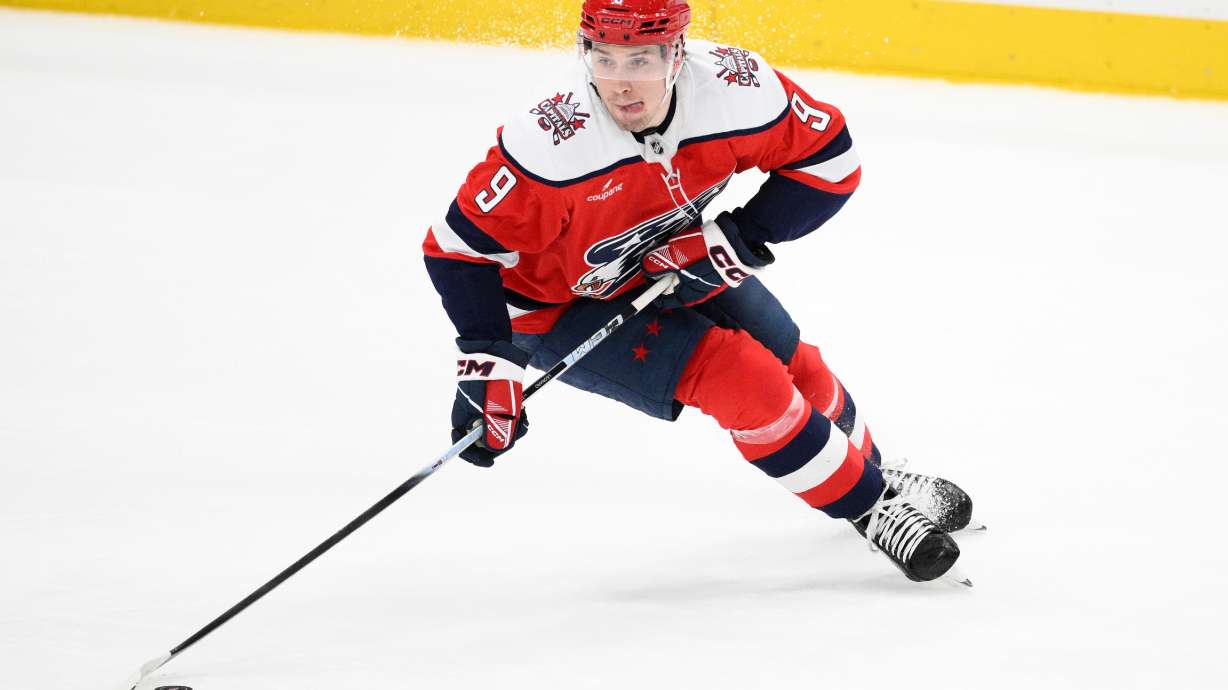FILE - Washington Capitals right wing Ryan Leonard (9) in action during the third period of an NHL hockey game against the Utah Mammoth, March 3, 2026, in Washington.