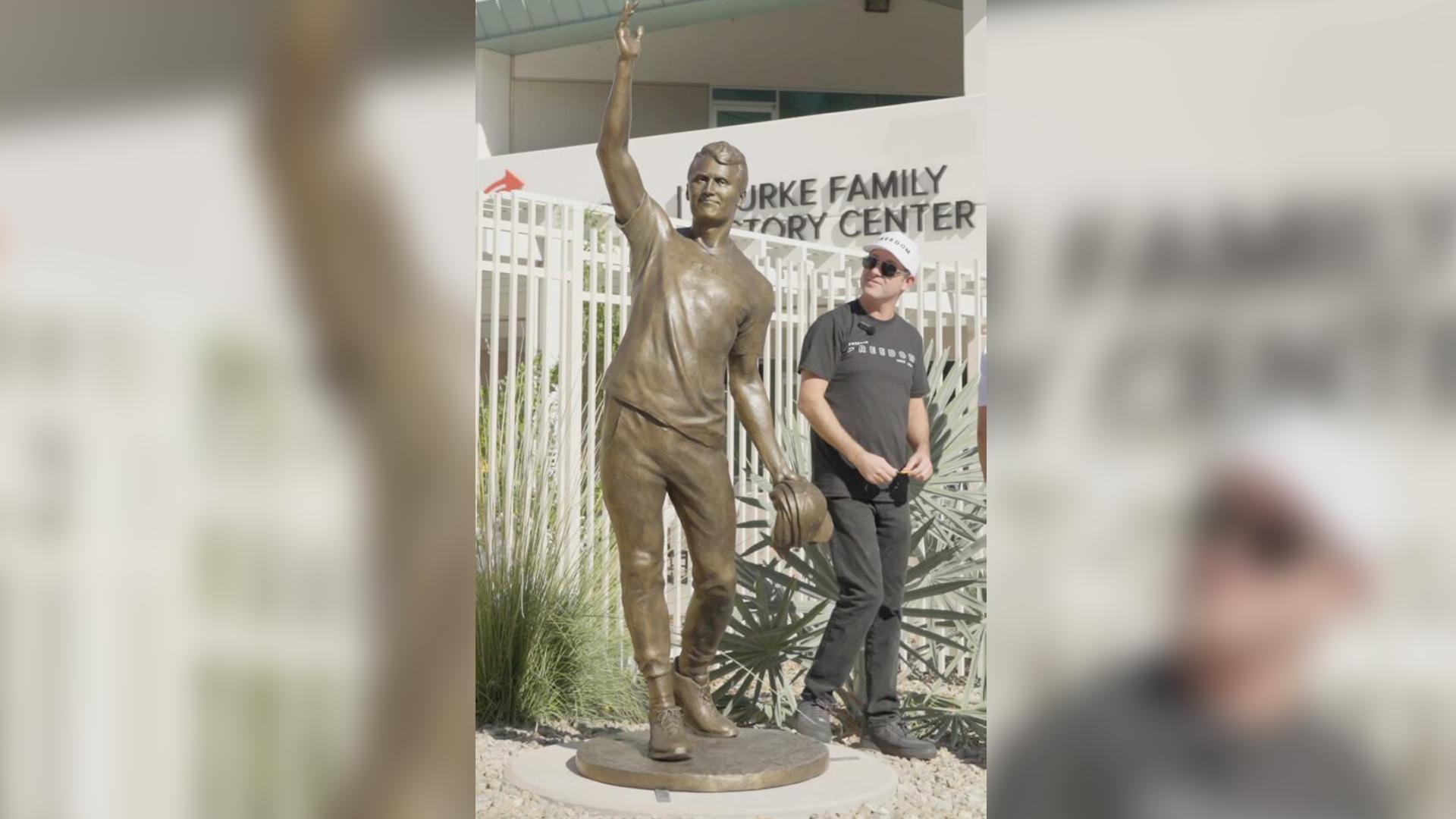 Turning Point USA unveils a statue of founder Charlie Kirk on Thursday in Phoenix, Ariz. The statue, sculpted by Utah artist Quintin McCann, was vandalized less than three days later.