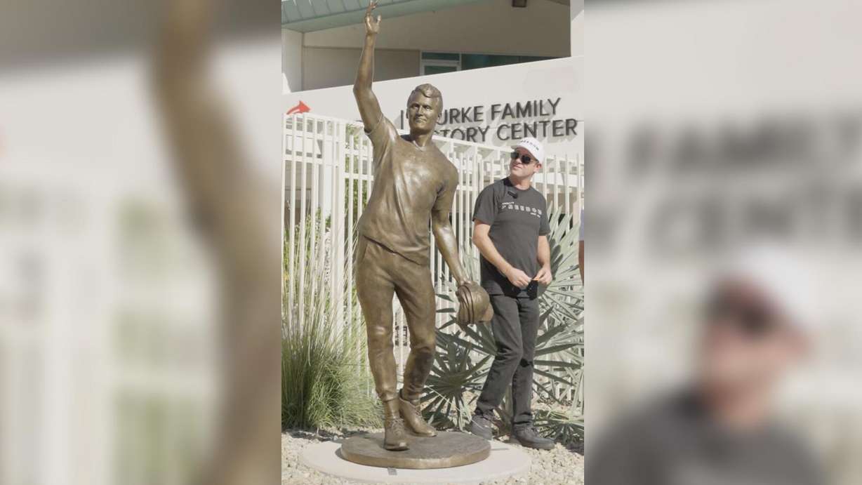 Turning Point USA unveils a statue of founder Charlie Kirk on Thursday in Phoenix, Ariz. The statue, sculpted by Utah artist Quintin McCann, was vandalized less than three days later.
