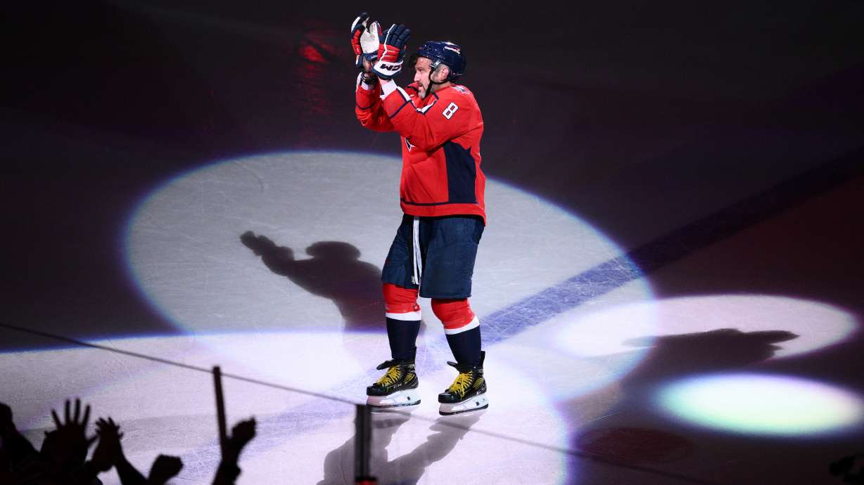 FILE - Washington Capitals left wing Alex Ovechkin reacts after he was named the first star after an NHL hockey game against the Pittsburgh Penguins, April 12, 2026, in Washington.