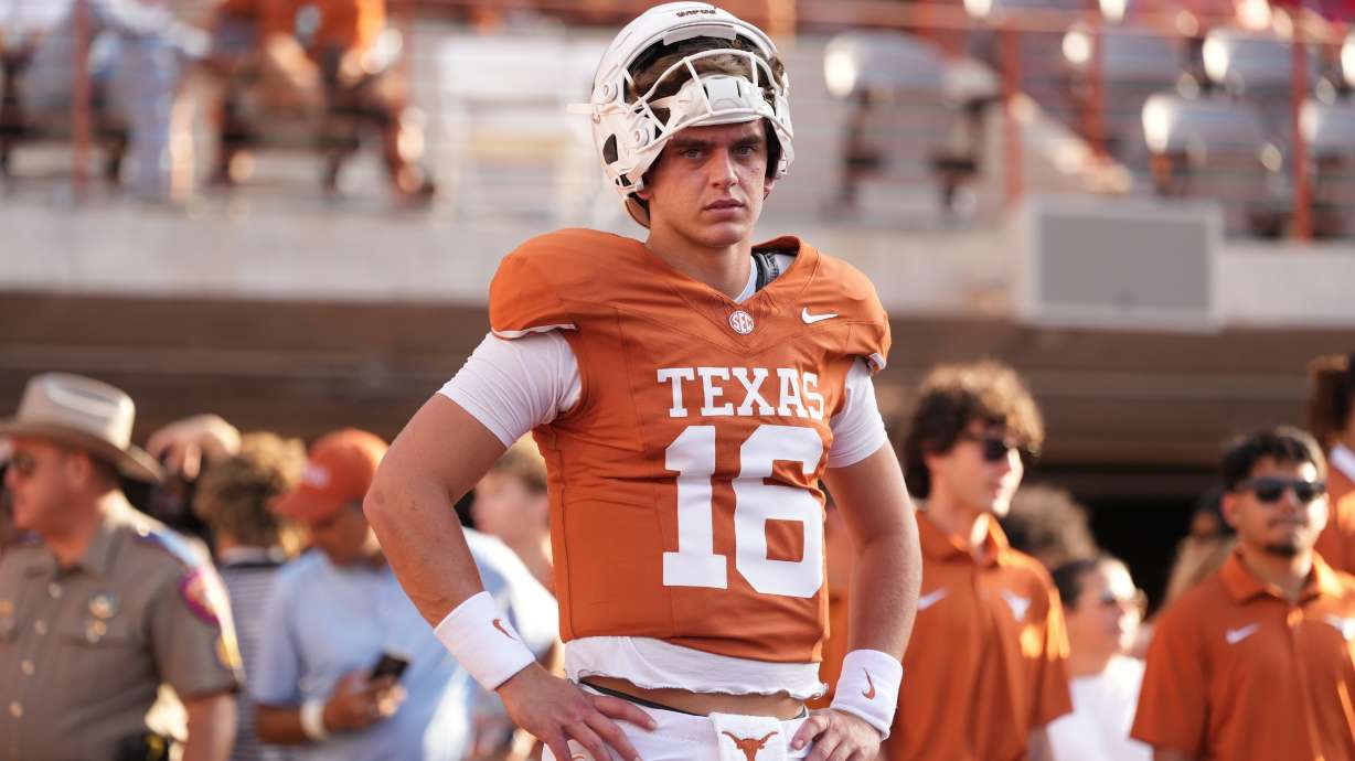 Texas quarterback Arch Manning (16) warms up before an NCAA college football game against Ohio State in Austin, Texas, Saturday, Sept. 12, 2026.