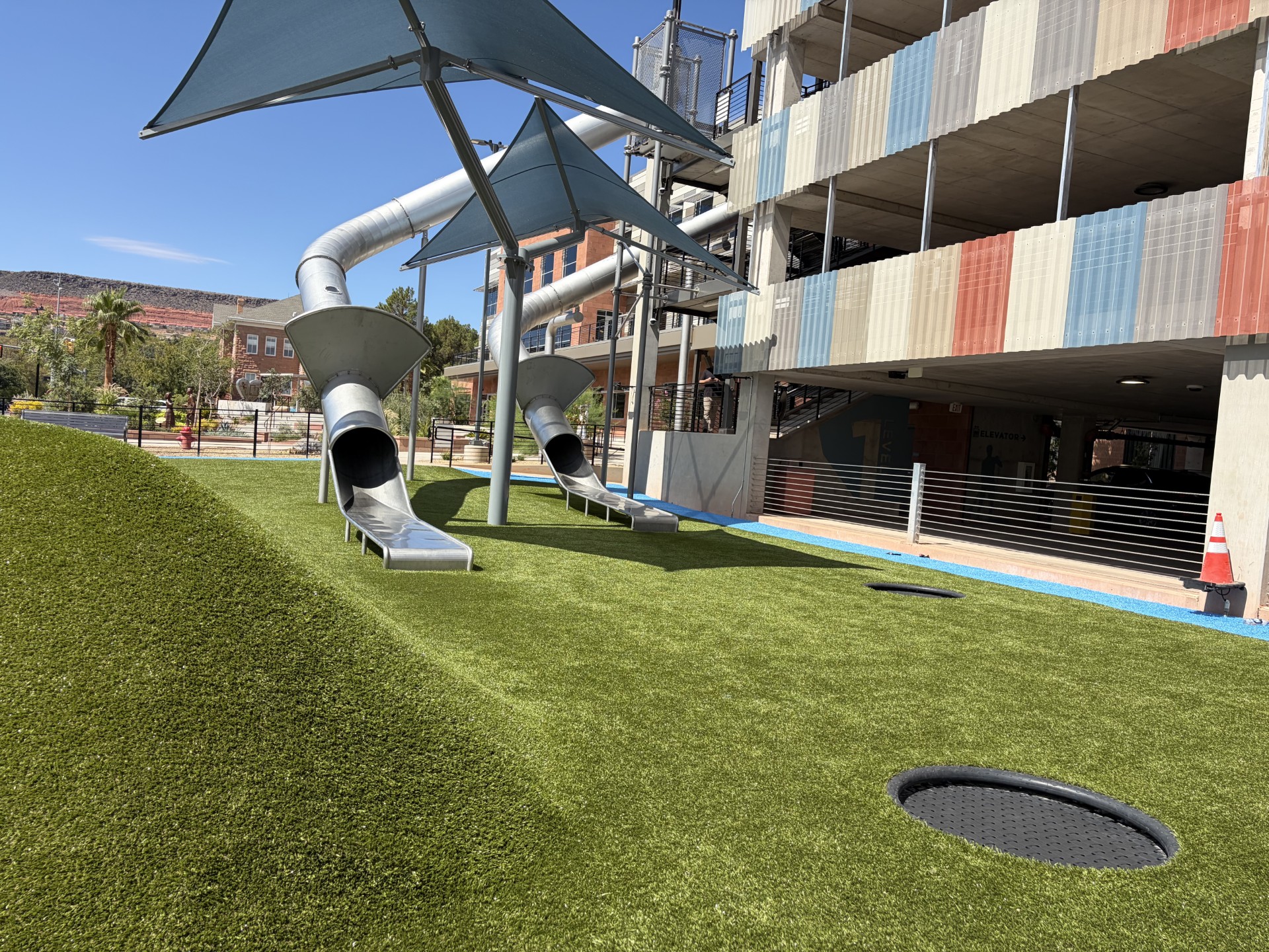 2 massive, stainless-steel slides at City Hall Plaza in St. George now open to public