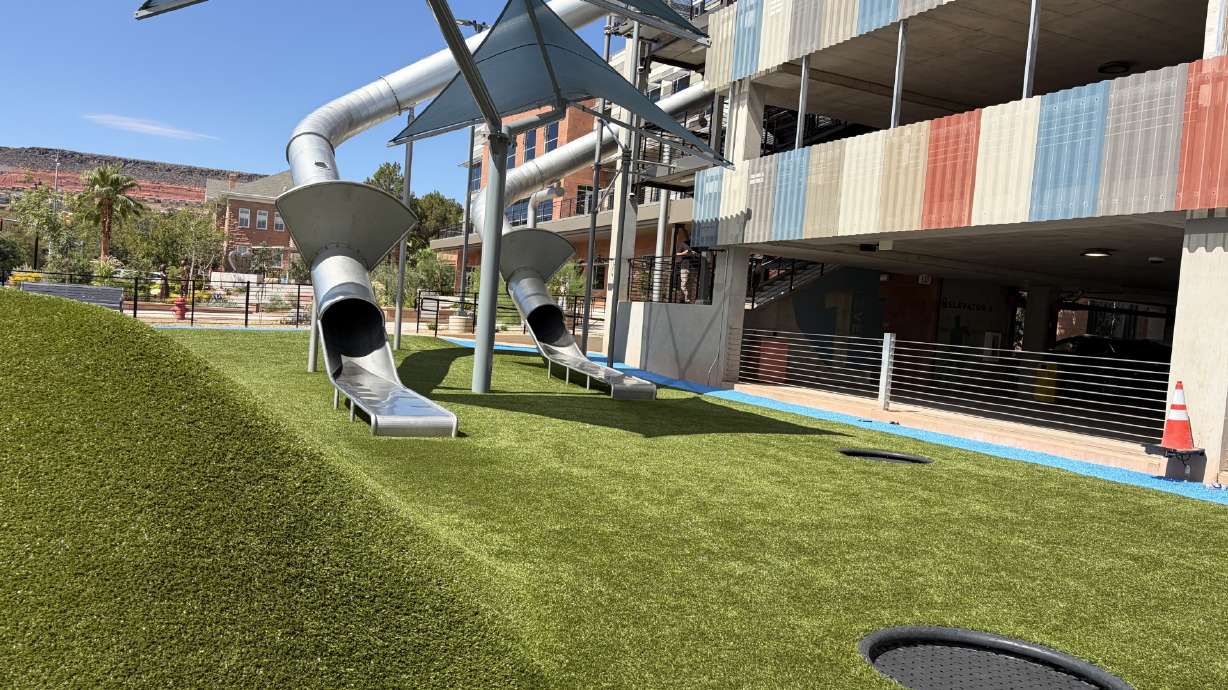 Two massive, stainless-steel slides at City Hall Plaza in St. George are now open for public use.