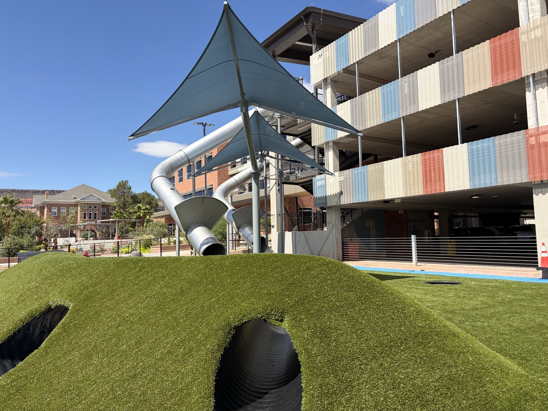 Two massive, stainless-steel slides at City Hall Plaza in St. George are now open for public use.