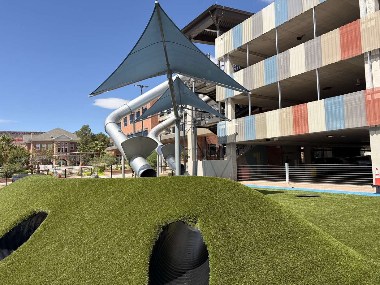 Two massive, stainless-steel slides at City Hall Plaza in St. George are now open for public use.