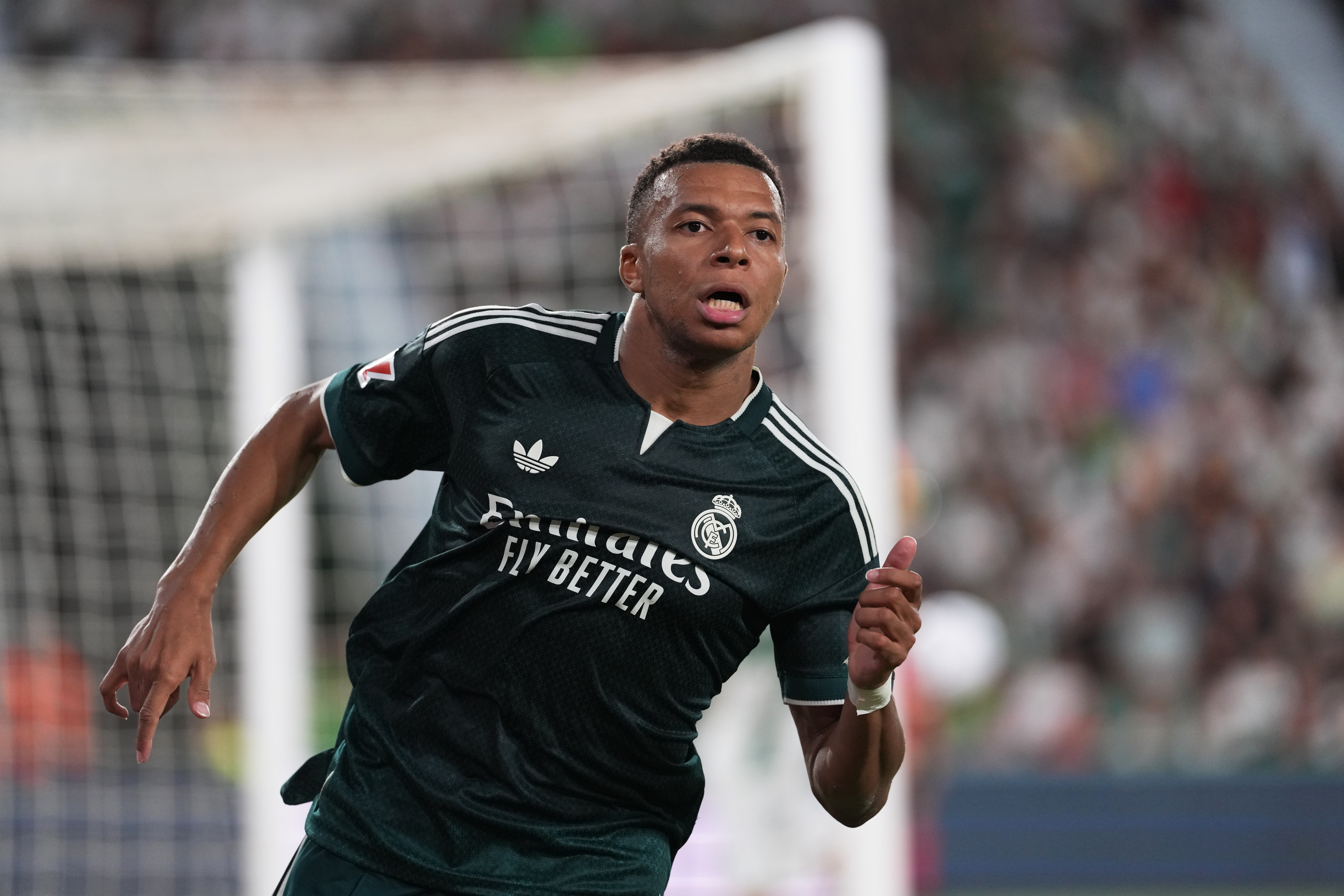 Real Madrid's Kylian Mbappe runs on the pitch during the Spanish La Liga soccer match between Elche and Real Madrid in Elche, Spain, Tuesday, Sept. 15, 2026. 