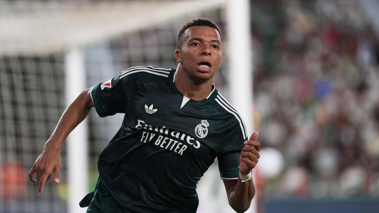 Real Madrid's Kylian Mbappe runs on the pitch during the Spanish La Liga soccer match between Elche and Real Madrid in Elche, Spain, Tuesday, Sept. 15, 2026.