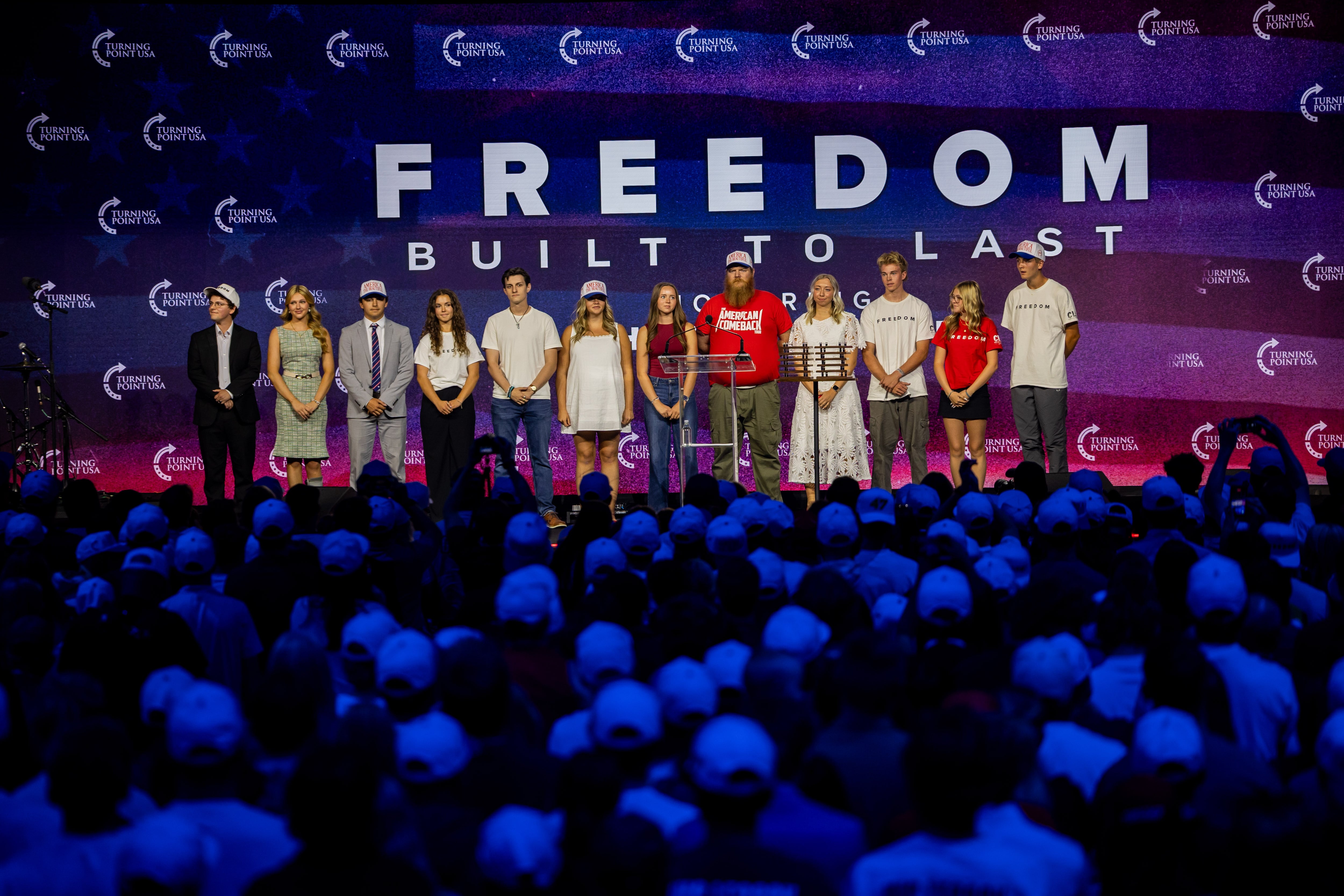 Turning Point USA’s Utah Valley University chapter members receive plaques at The Freedom Built to Last Memorial Honoring Charlie Kirk hosted by Turning Point USA at the UCCU Center in Orem on Thursday. UVU has faced more controversy for increased perceived censorship since Kirk's assassination.