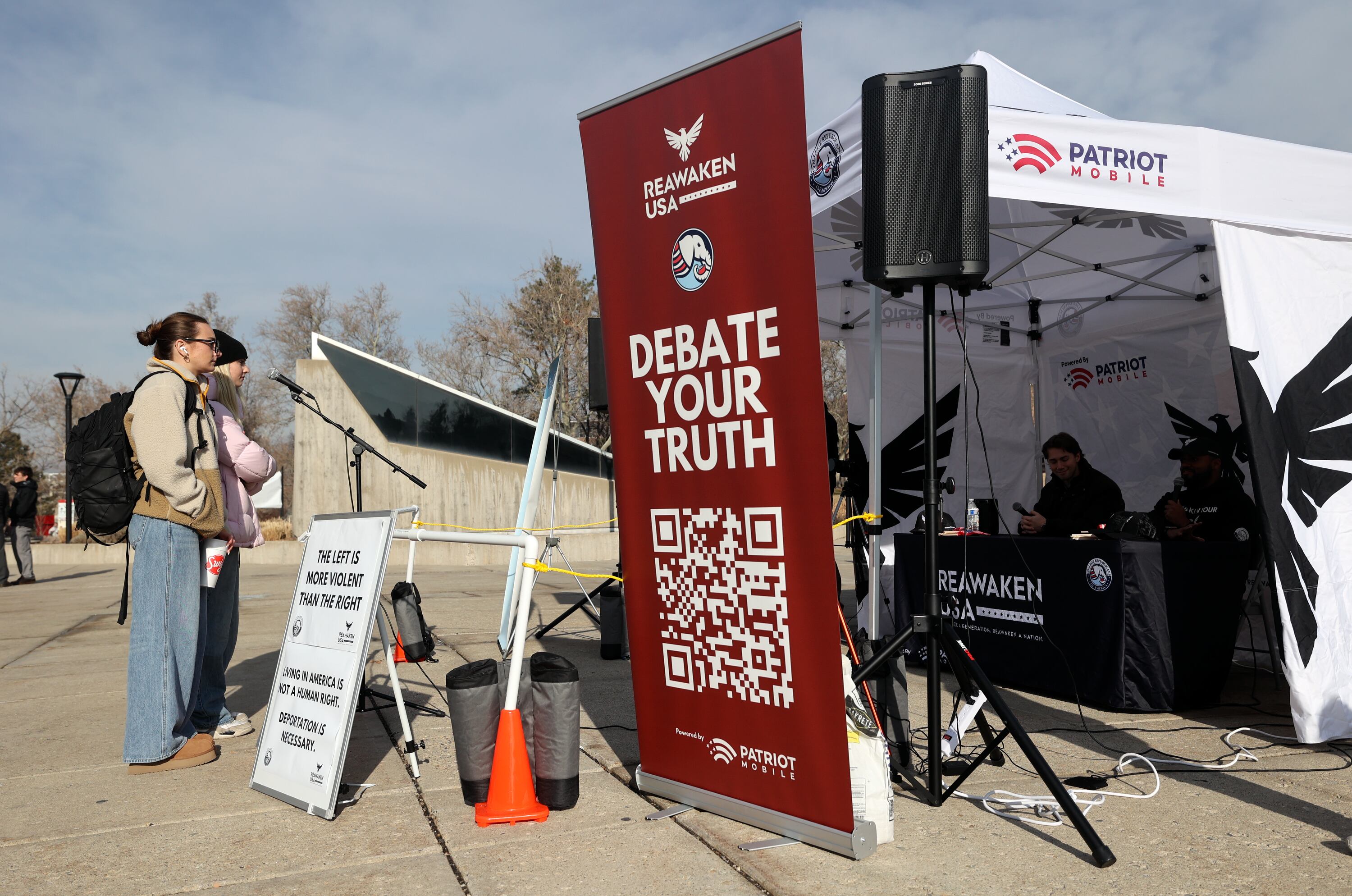 University of Utah sophomores Maia Laule and Hailey Watts participate in a conversation during the Utah Federation of College Republicans' Reawaken Tour open mic debate at the University of Utah in Salt Lake City on Jan. 13. The U. received a "D-" from FIRE for free speech on campus.