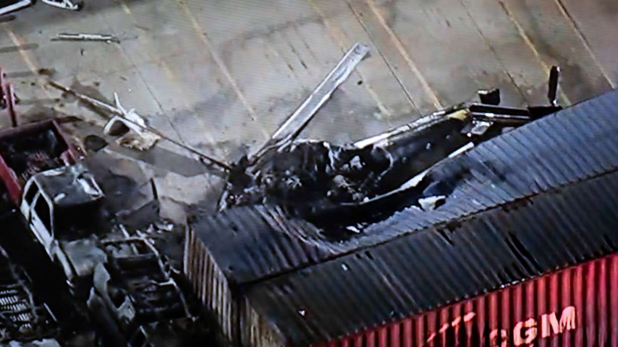 A helicopter that crashed near a deadly bus crash, in Los Angeles on Tuesday. At least three people were killed in the chopper crash.