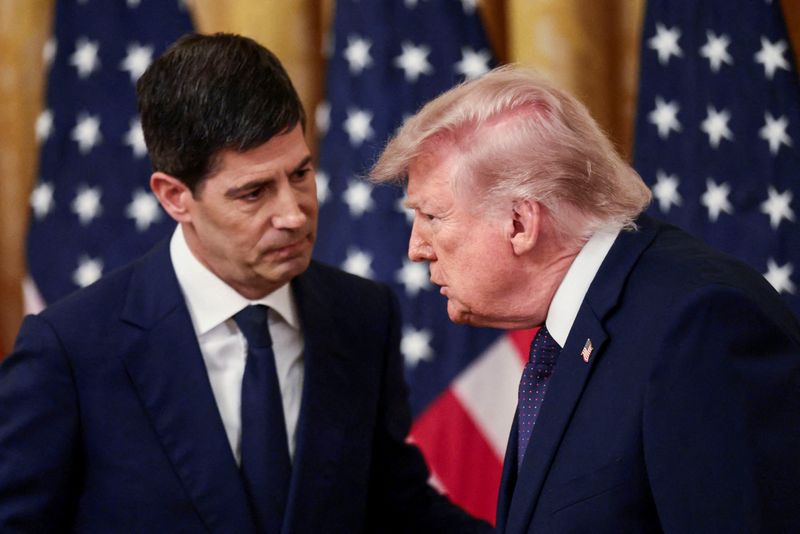 President Donald Trump speaks with Federal Reserve Chair Kevin Warsh on the day of Warsh's swearing in, in the East Room of the White House in Washington, May 22. The Fed's expected rate hike on Wednesday would fly in the face of Trump.