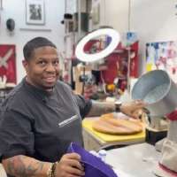 Master milliner transforms silent battle against depression into wearable art