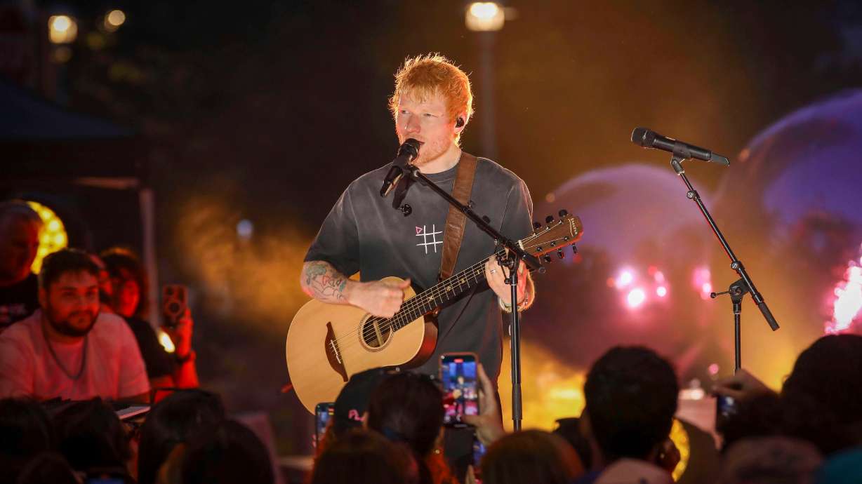 Singer-songwriter Ed Sheeran performs during "Ed Sheeran's Play: Live from New York" presented by TikTok at Domino Square in the Brooklyn borough of New York, Sept. 13, 2025. Ed Sheeran's tour of North and South America has been roiled by the decision this week to drop Macklemore as an opener because of the rapper's onstage pro-Palestinian comments.