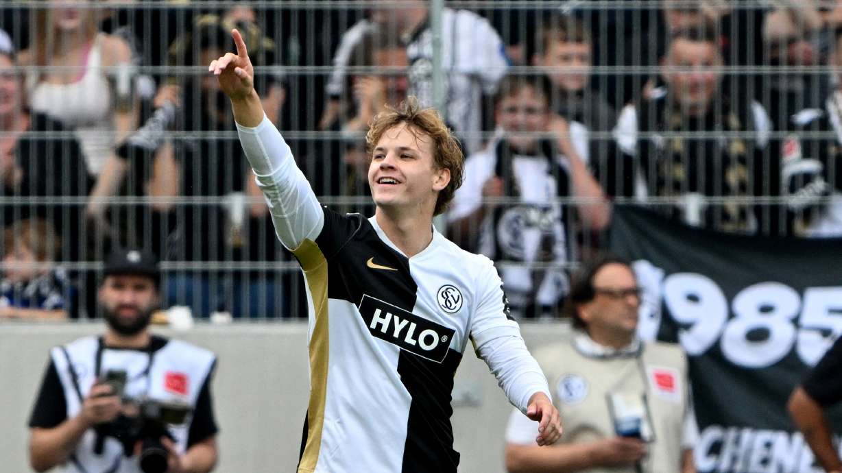 Elversberg's Cole Campbell celebrates after scoring during a Bundesliga soccer match between Elversberg and Bayer Leverkusen, in Spiesen-Elversberg, Germany, Saturday, Aug. 29, 2026.