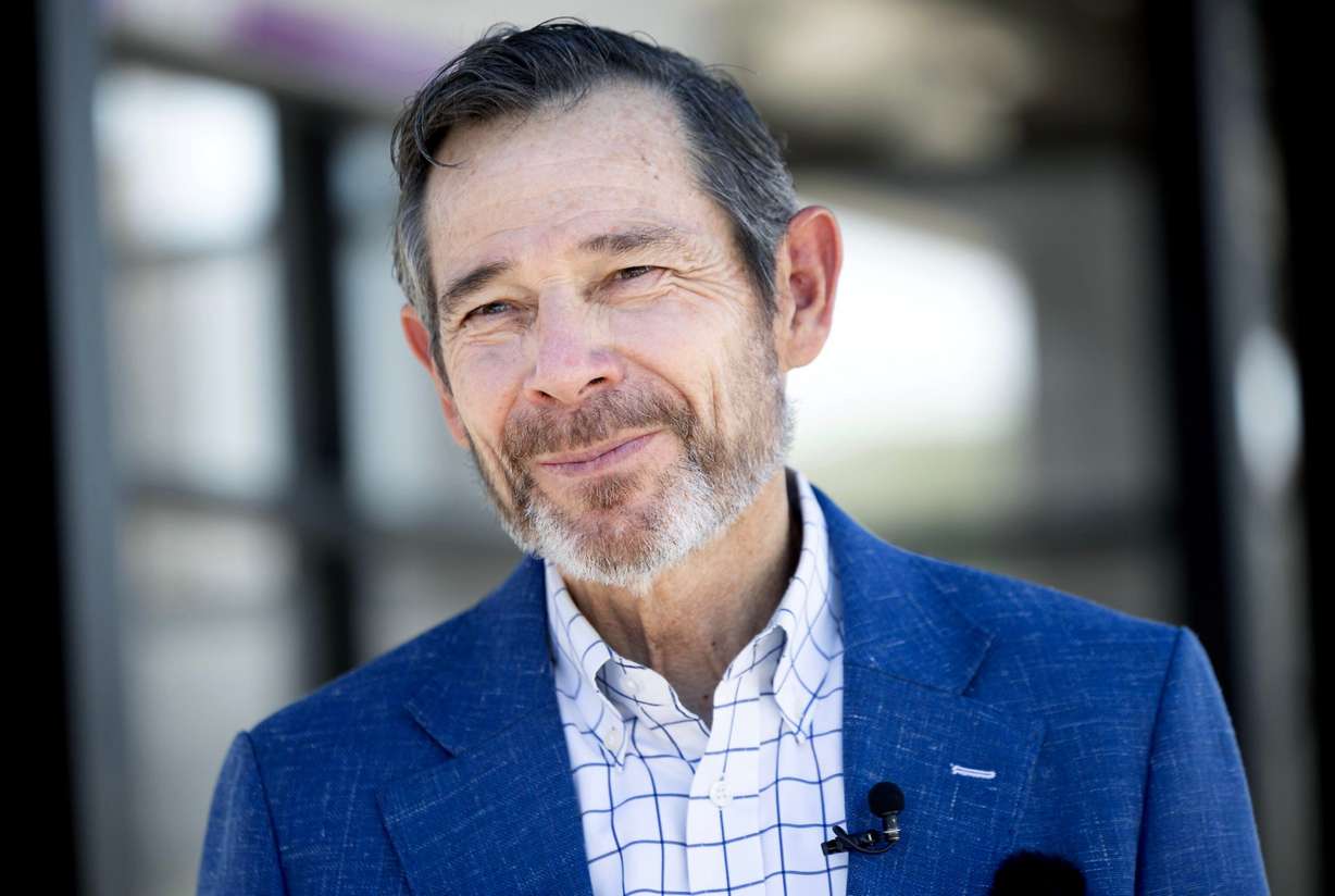 Sen. John Curtis at a TRAX station in Salt Lake City on Aug. 19. Curtis is calling for AI executives to meet with lawmakers.