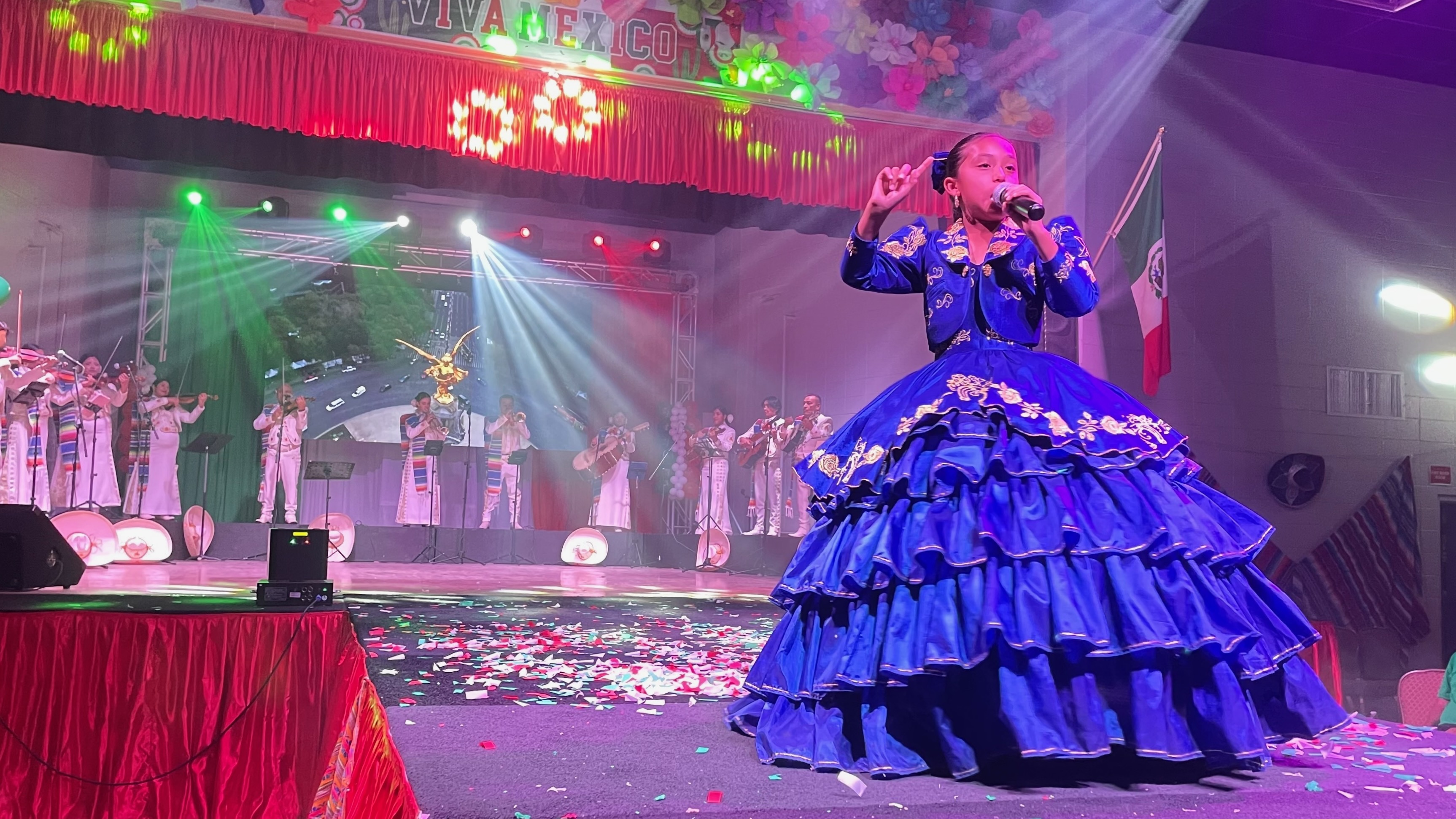 Utah's Mexican and Mexican American community marked Mexican Independence Day at the Mexican Civic Center in Salt Lake City on Tuesday. One of the performers sings at the event.