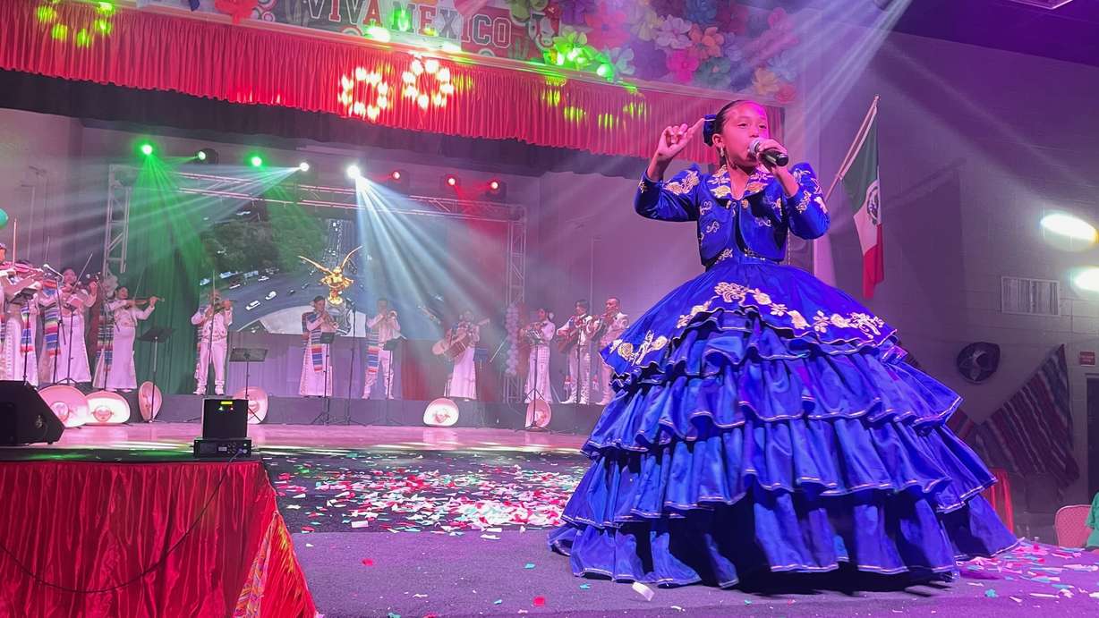 Utah's Mexican and Mexican American community marked Mexican Independence Day at the Mexican Civic Center in Salt Lake City on Tuesday. One of the performers sings at the event.