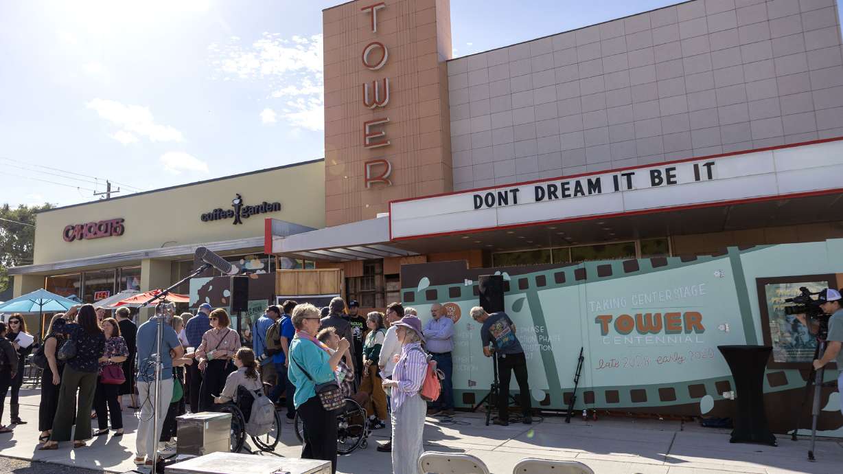 People gather outside the Tower Theatre following announcements about the theater project’s update in Salt Lake City on Wednesday. The project is expected to begin in earnest next year, before reopening in 2028 — the centennial year for the building.