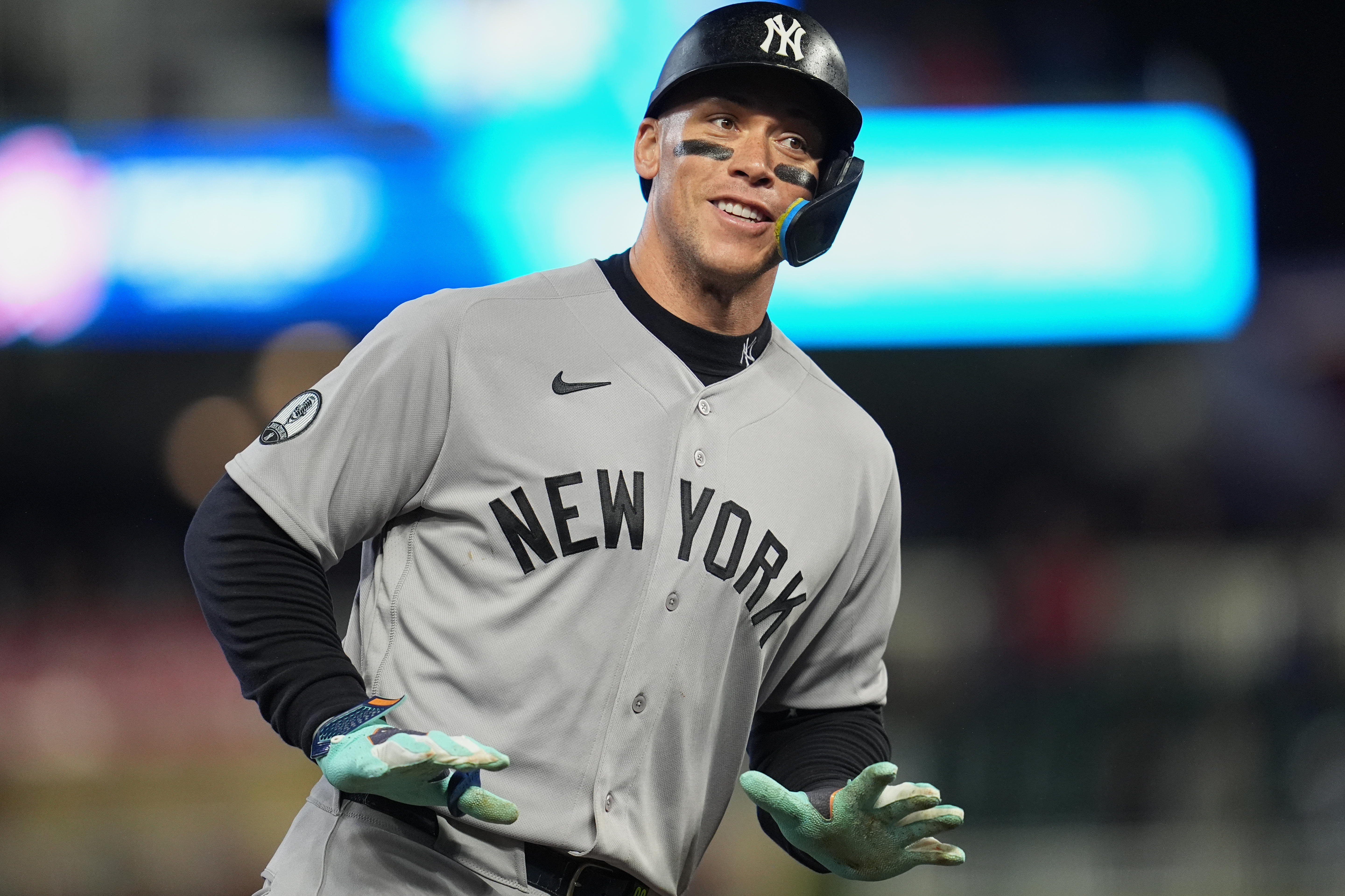 New York Yankees' Aaron Judge celebrates while running the bases after hitting a three-run home run during the eighth inning of a baseball game against the Minnesota Twins, Monday, Sept. 14, 2026, in Minneapolis. 