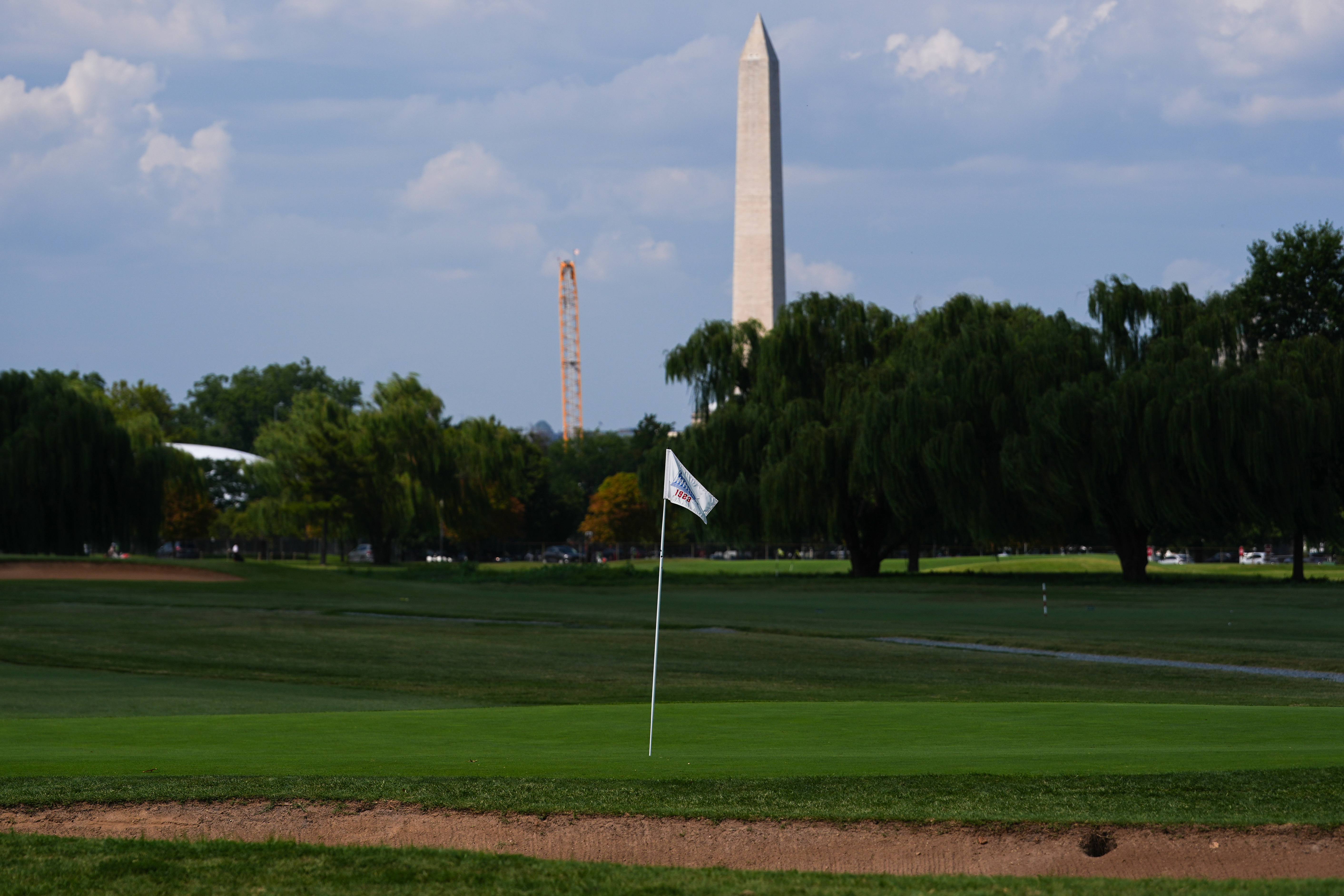 The Washington Monument is seen beyond the East Potomac Park Golf Course, Tuesday, Sept. 1, 2026, in Washington. 