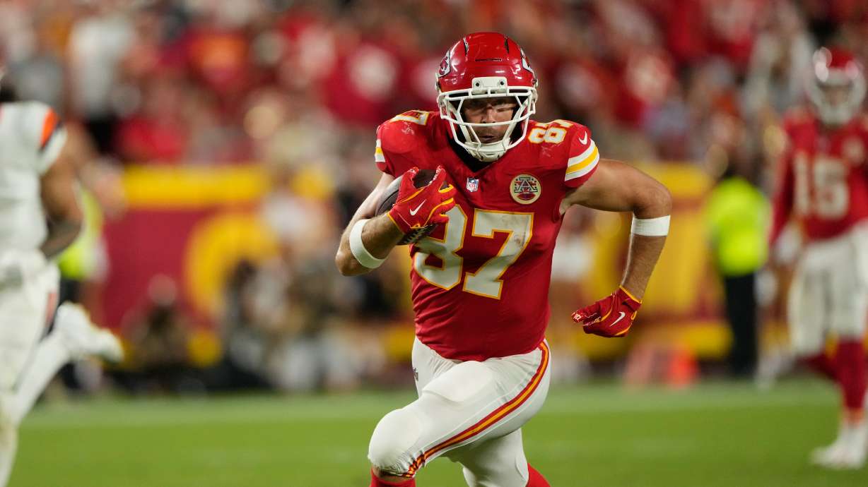 Kansas City Chiefs tight end Travis Kelce runs the ball after making a catch against the Denver Broncos during the second half of an NFL football game Monday, Sept. 14, 2026, in Kansas City, Mo.