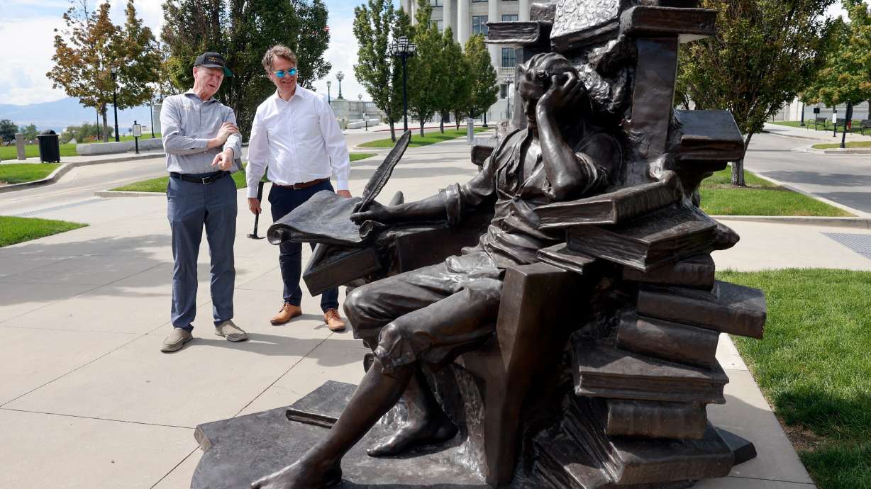 Steven Neal and Michael Hall look at Hall’s sculpture of Thomas Jefferson outside of the Capitol in Salt Lake City on Wednesday. It will be on display for 18 months, alongside Neal’s sculpture of George Washington.