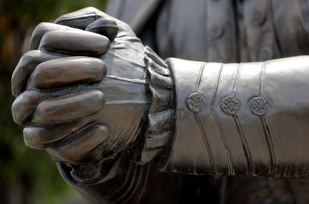 The buttons on Steven Neal’s sculpture of George Washington are replicas of historical buttons from that time frame, pictured outside the Capitol in Salt Lake City on Wednesday.