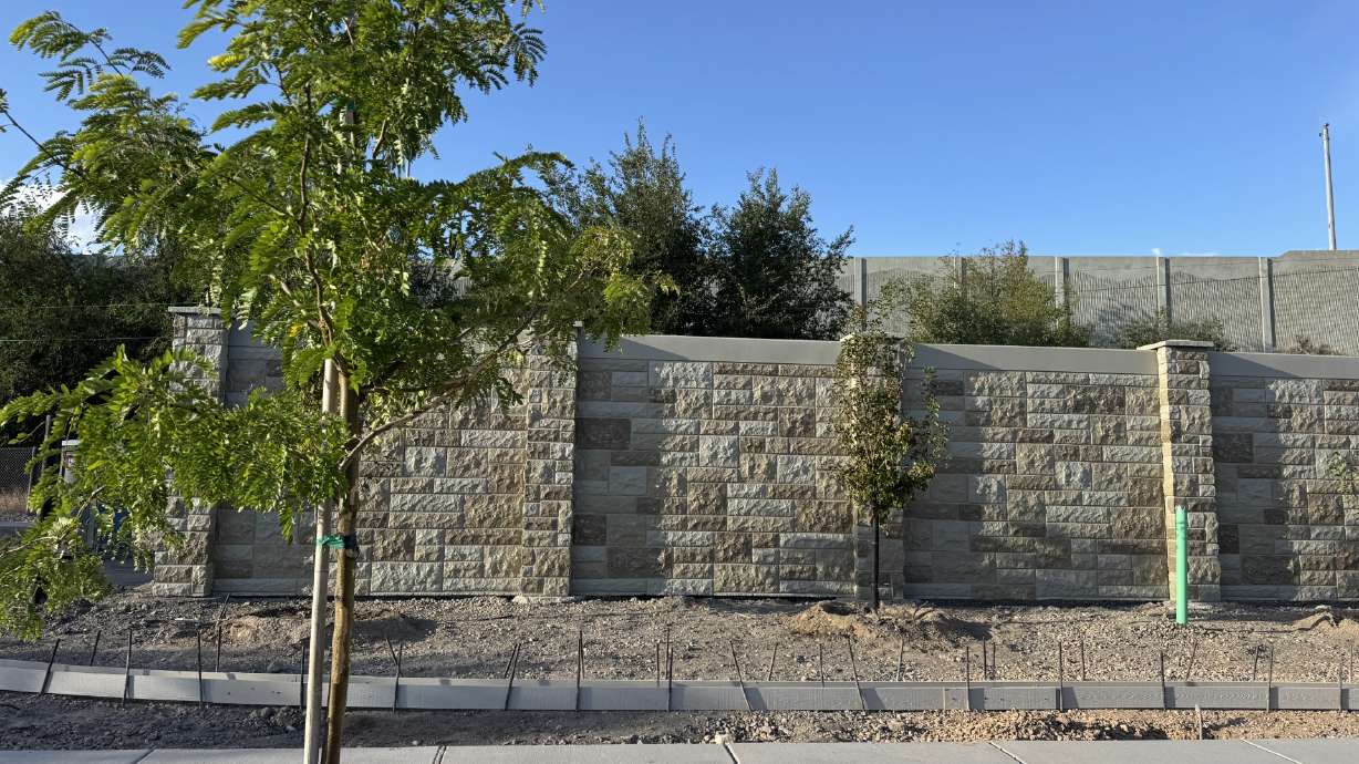 Wall constructed at site of planned biotower near 1030 W. Pierpont Ave. in Salt Lake City. A biotower project on the city's west side was taking shape Wednesday after neighborhood complaints earlier in the year prompted utility crews to make modifications.